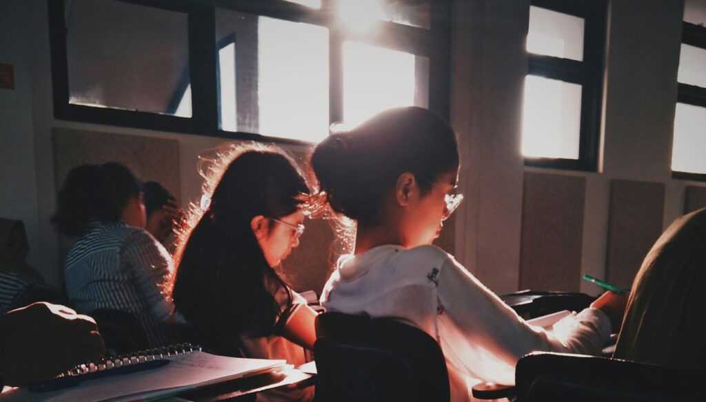 How I Overcame Test Anxiety and Actionable Strategies High School Students Can Use to Ace Standardized Exams, by Dr. Shaan Patel. Photograph of students taking exams by Yustinus Tjiuwanda